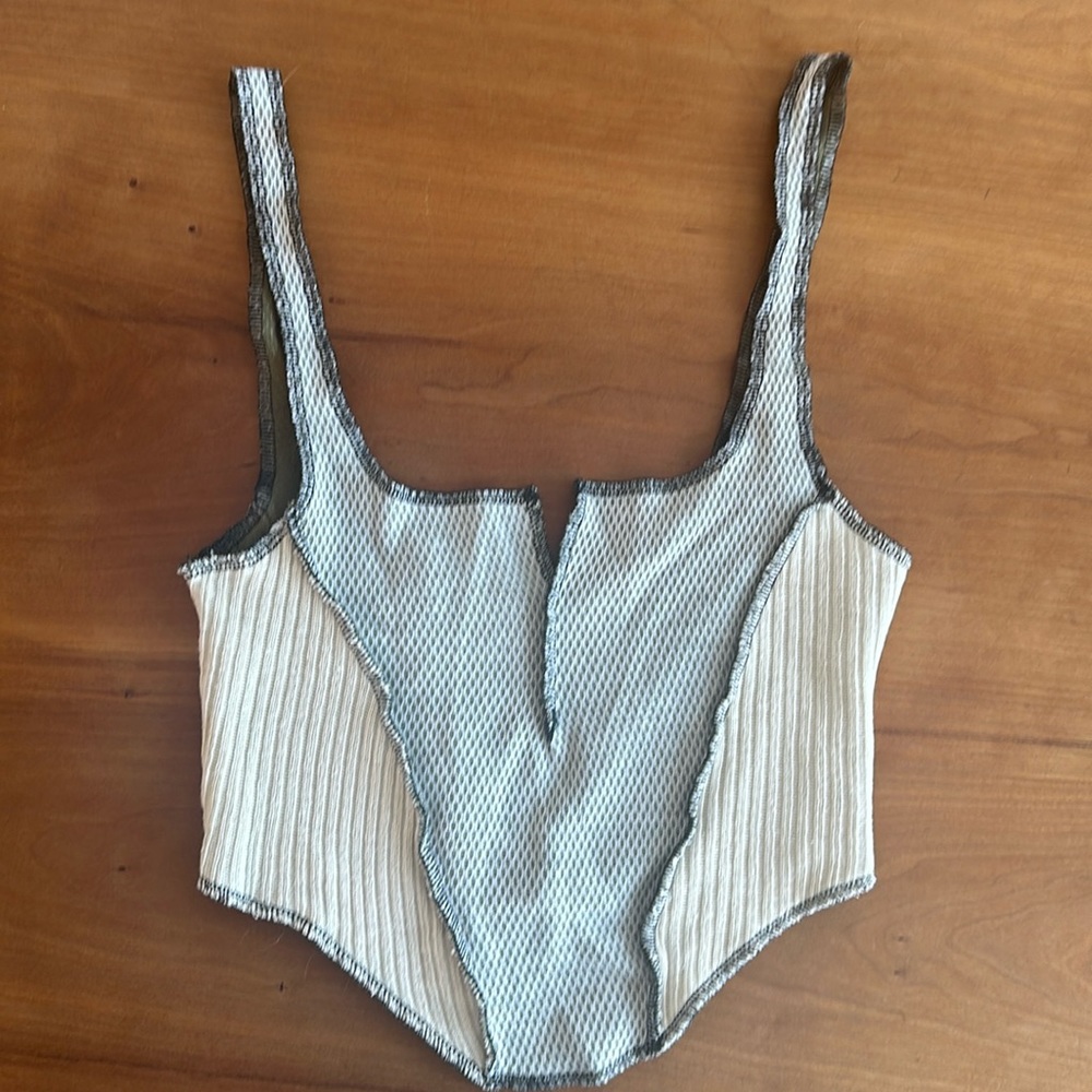 UO out from under tank top